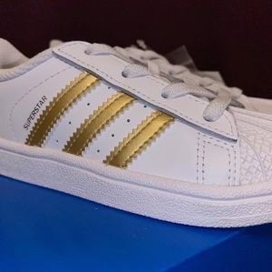 Superstar I white and gold Adidas sneakers